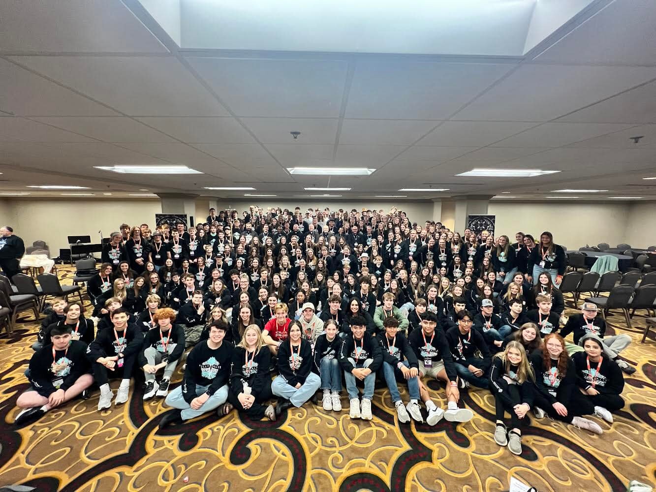About 250 high school teens from the Jefferson City diocese gather for a photo with Bishop W. Shawn McKnight and several priests of the diocese on Nov. 17 during the National Catholic Youth Conference in Indianapolis.